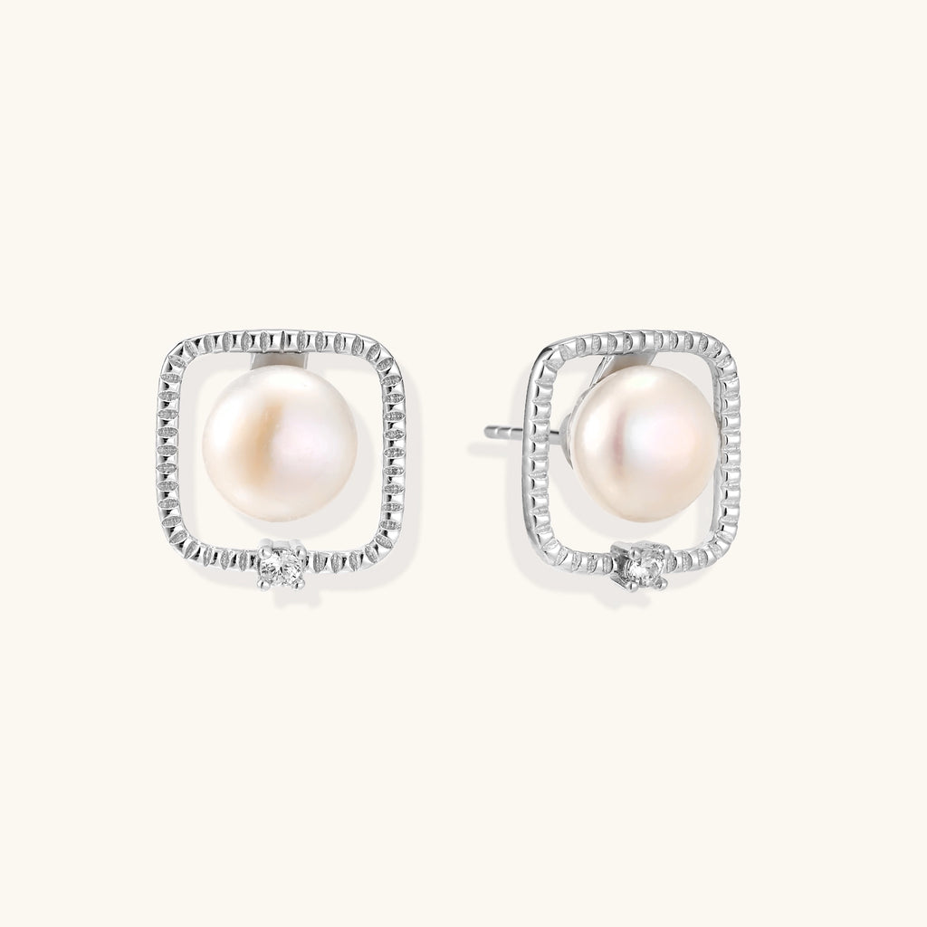 Square sterling silver stud earrings with freshwater pearls and crystal accents on white background.
