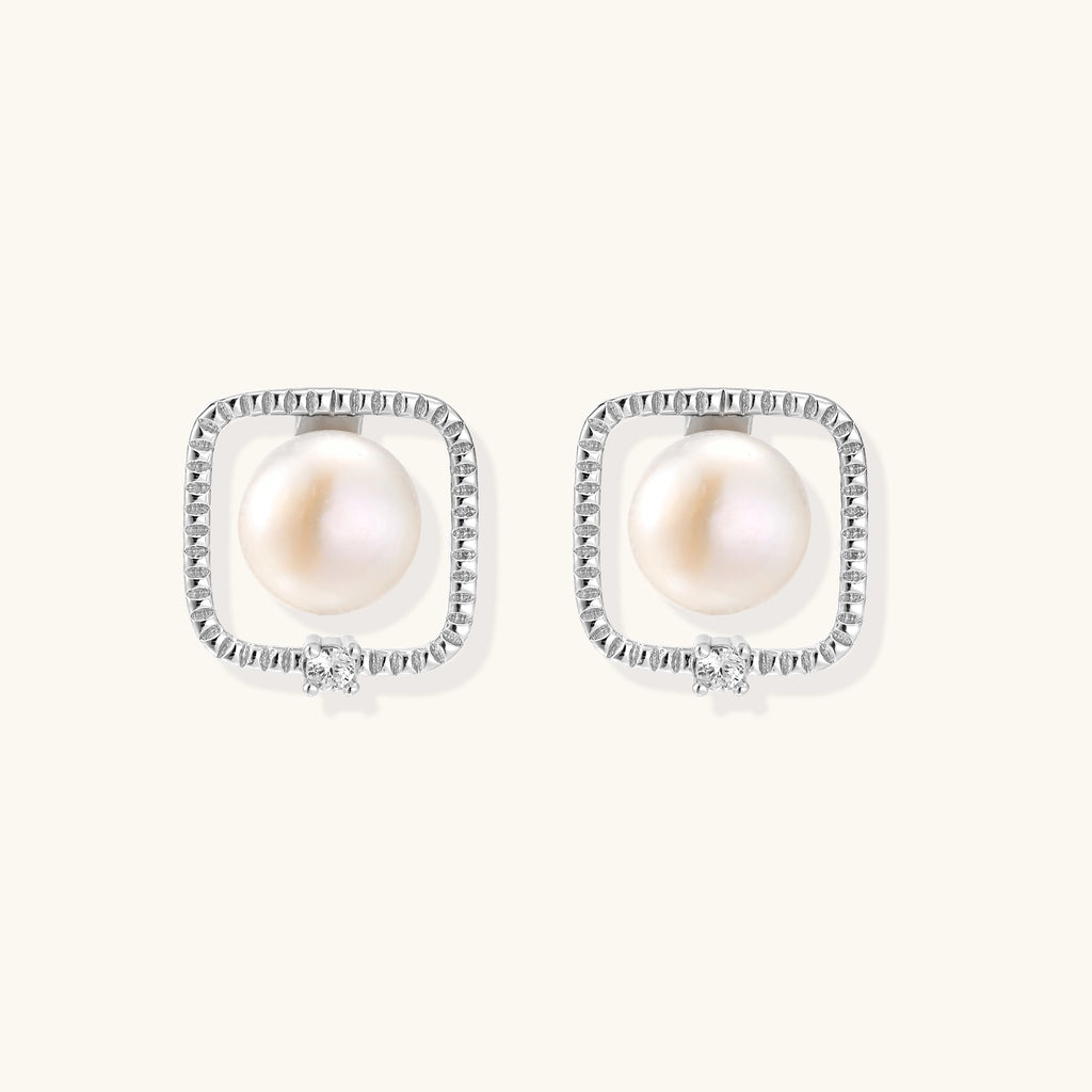 Square sterling silver stud earrings with freshwater pearls and crystal accents on white background.