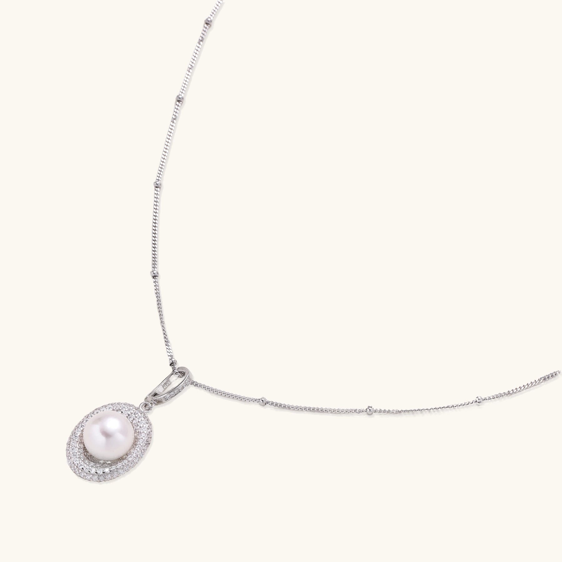 Sterling silver necklace with freshwater pearl in sparkling crystal halo pendant on delicate beaded chain