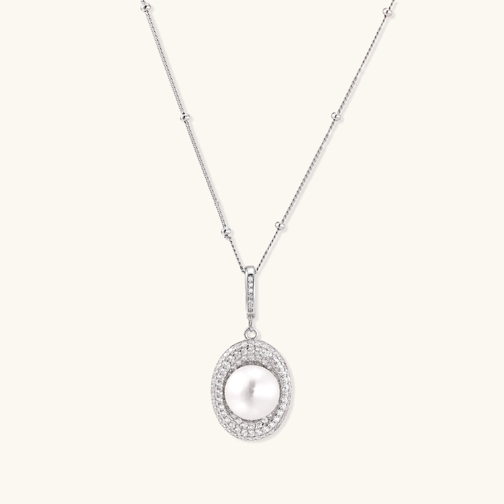 Sterling silver necklace with freshwater pearl in sparkling crystal halo pendant on delicate beaded chain