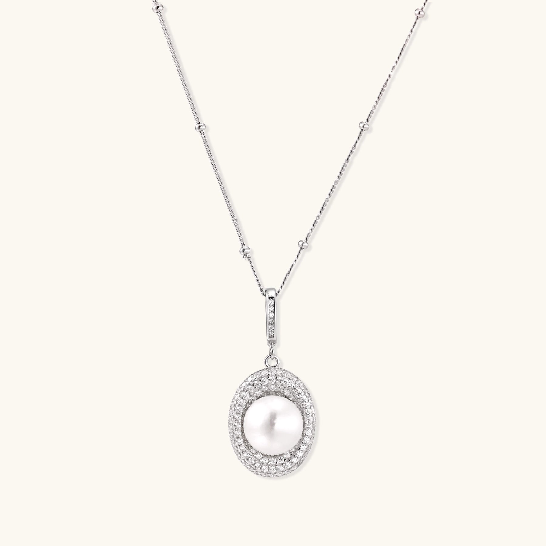 Sterling silver necklace with freshwater pearl in sparkling crystal halo pendant on delicate beaded chain