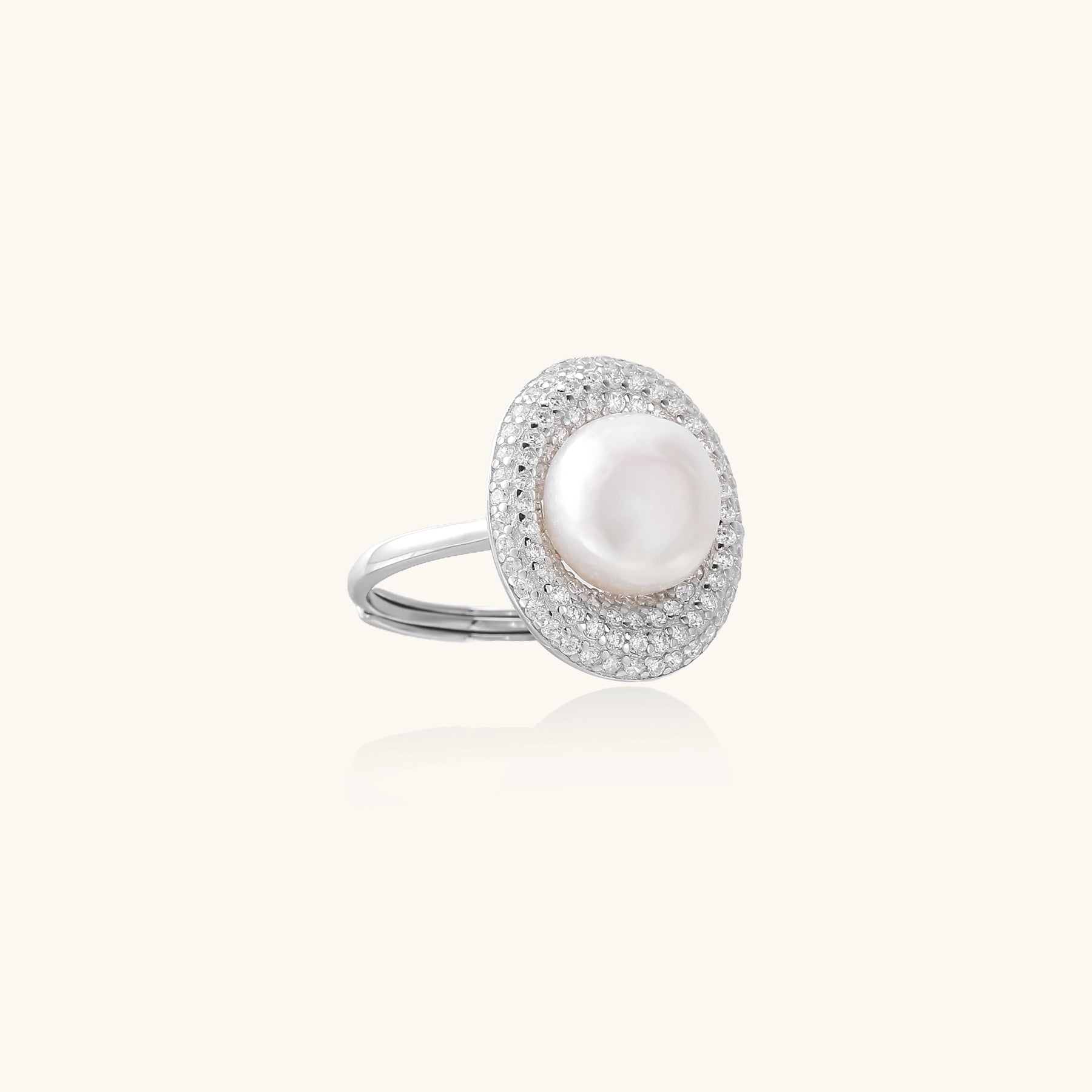 Sterling silver ring with 9mm freshwater pearl center surrounded by double halo of sparkling crystals
