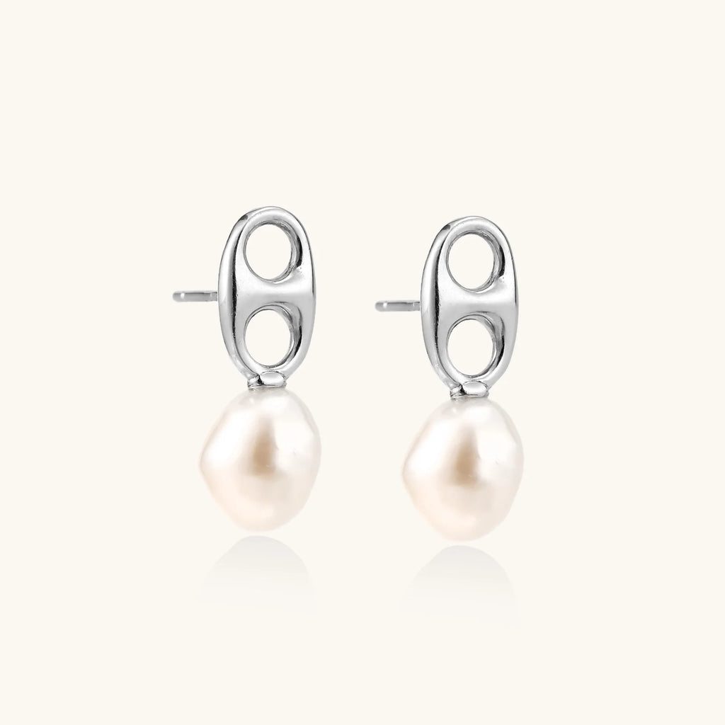 Modern rhodium-plated silver earrings with geometric double-circle design and freshwater pearl drops