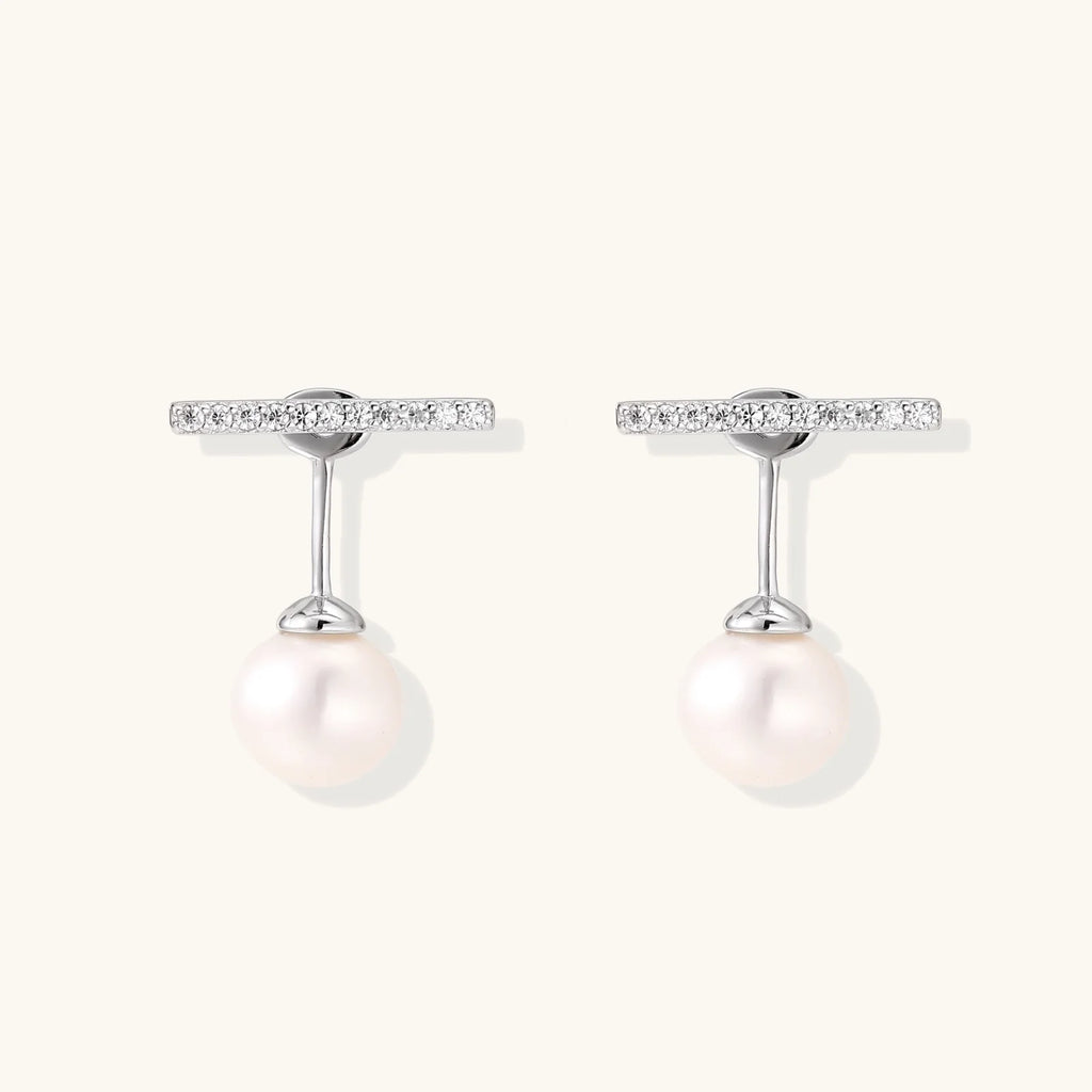 Rhodium-plated sterling silver ear jacket earrings with diamond-set horizontal bar and freshwater pearl drop